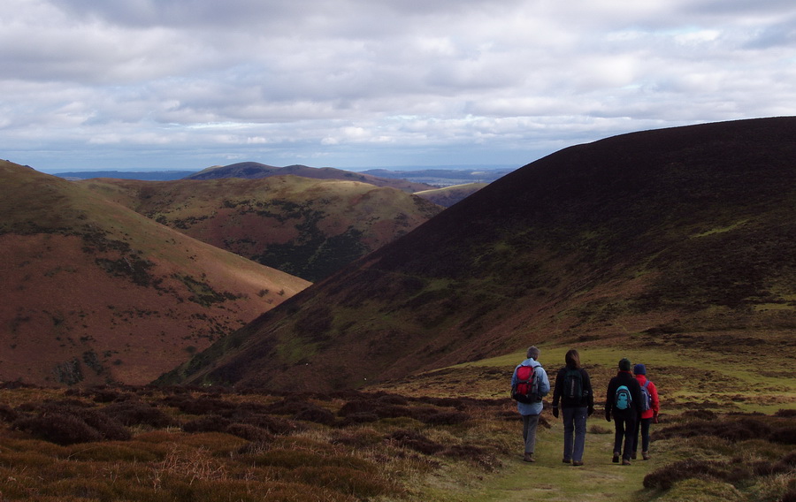 walking on the Long Mynd with views towards the Stretton hills
